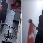 Man with giant Singapore flag puzzles netizens