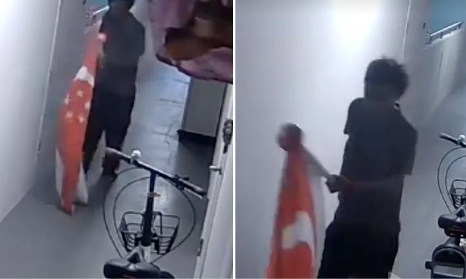 Man with giant Singapore flag puzzles netizens Man with giant Singapore flag puzzles netizens