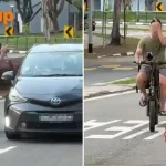 E-bike rider flashes middle finger at driver in Tampines