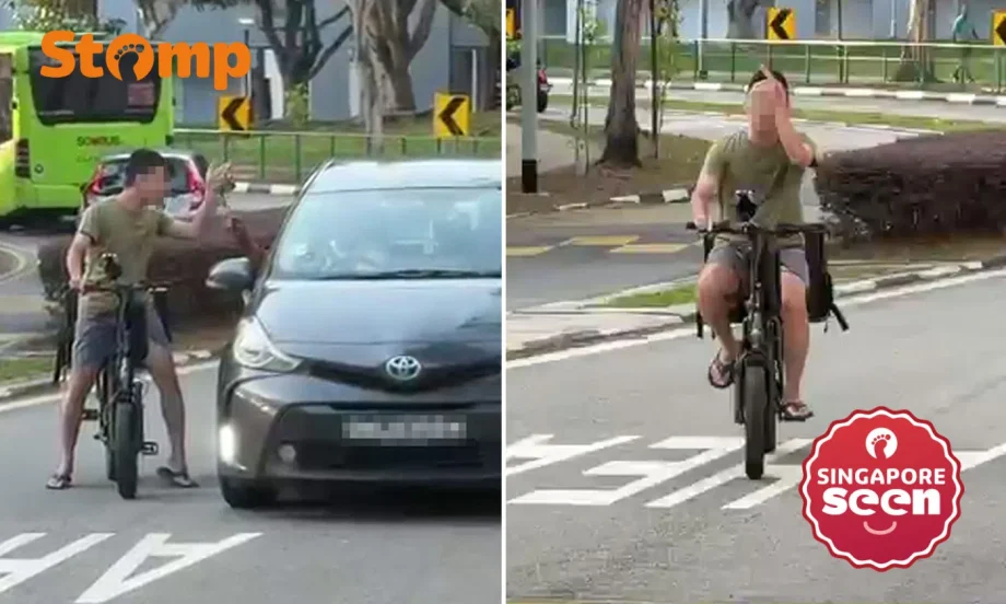 E-bike rider flashes middle finger at driver in Tampines E-bike rider flashes middle finger at driver in Tampines