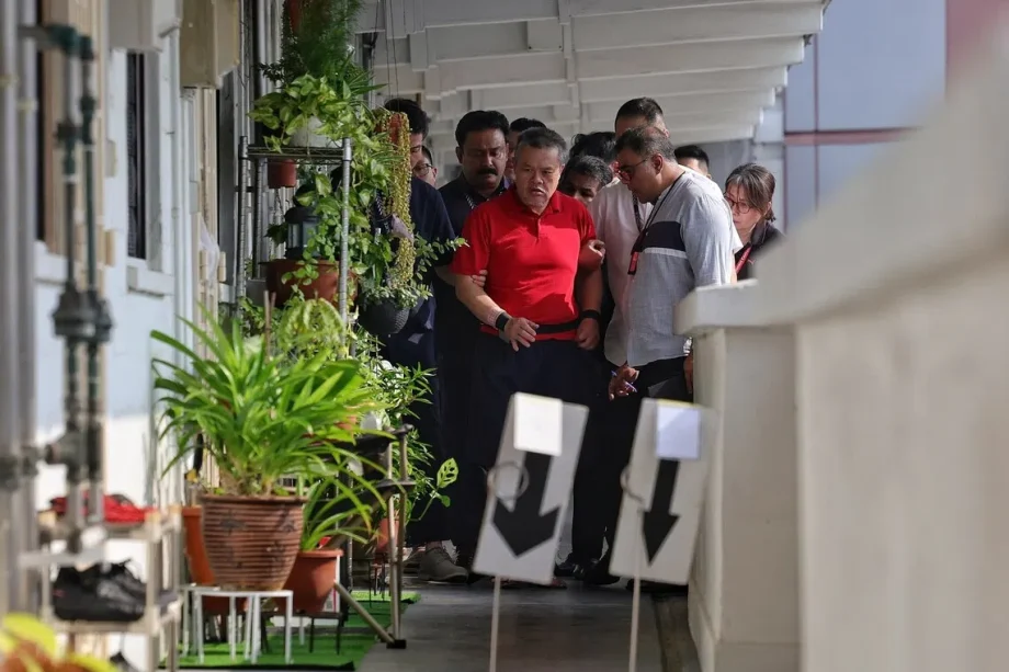 Lengkok Bahru murder suspect taken back to crime scene Lengkok Bahru murder suspect taken back to crime scene