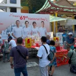 Seventh month offerings near National Day banner