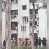 Boy stranded on HDB ledge after lock battery dies