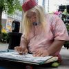 The para-athlete who once won a medal for Singapore and now sells art on the streets of Kuala Lumpur