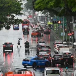 Temperature falls to 22.7 deg C in Tuas; heavy rain triggers 2 flash floods