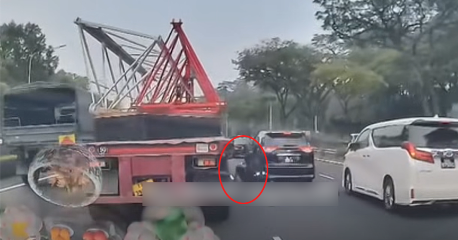 Motorcyclist sent tumbling into path of trailer after rear-ending car on PIE, Singapore News Motorcyclist sent tumbling into path of trailer after rear-ending car on PIE, Singapore News