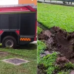 SCDF fire engine stuck in grass patch near Sengkang HDB block