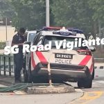 Singapore police car crashes into road divider; cop helping with investigations