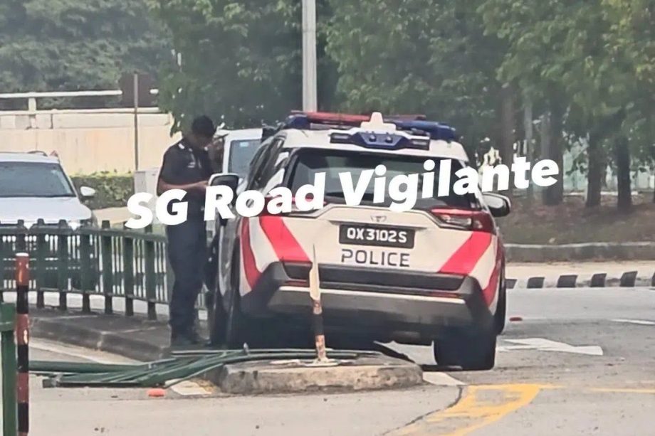 Singapore police car crashes into road divider; cop helping with investigations Singapore police car crashes into road divider; cop helping with investigations