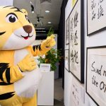 Common scam hooks turned into calligraphy at Maybank exhibition