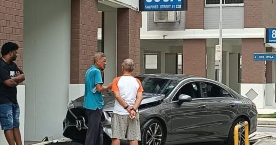 Car skids into wall at Tampines HDB block Car skids into wall at Tampines HDB block