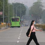 Singapore haze improves but remains unhealthy
