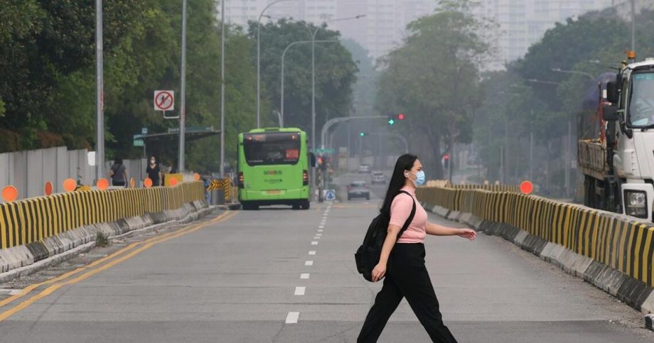 Singapore haze improves but remains unhealthy
