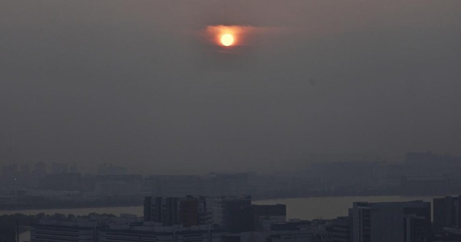 Singapore haze: PSI in unhealthy range Singapore haze: PSI in unhealthy range