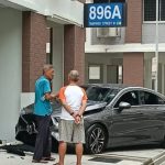 Car skids, crashes into wall at Tampines HDB block