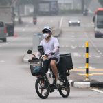 Singapore haze eases overnight, but air quality remains unhealthy